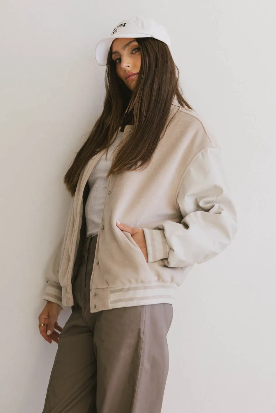 Call The Shots Varsity Jacket in Mocha Welt Pockets Slit Pockets Flap Pockets